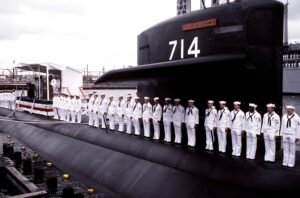 crew-members-line-the-deck-of-the-nuclear-powered-attack-submarine-uss-norfolk-751ed6-1024